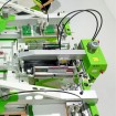 ROQ FOIL integrated on a screen printing carousel for metallic effects on textiles