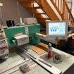 Used Tajima TFSN-912 industrial embroidery machine, 12 heads