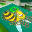 Machine ROQ FLOCK pour application automatique de fibres flock en sérigraphie textile